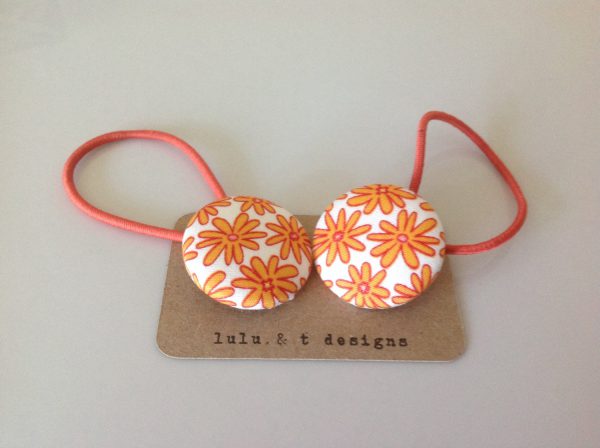 orange flower hair ties, flower fabric covered button hair tie pair